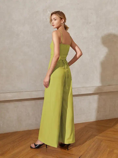 Heloise Statement Jumpsuit In Green - full-length back shot on model - Miss Mosa By Akanksha