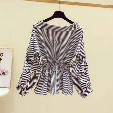 Henri Statement Striped Blouse - back shot on hanger, black and white - Miss Mosa By Akanksha