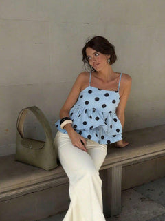 Hola Polka Top - seated front shot, light blue with black polka dots - Miss Mosa By Akanksha