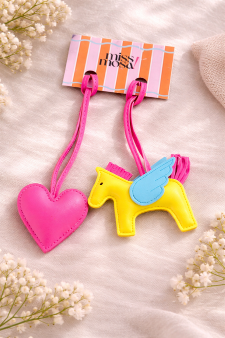 Horse and Heart Set of 2 Bag Charms - flat-lay shot of charms on brand card, pink and yellow - Miss Mosa By Akanksha