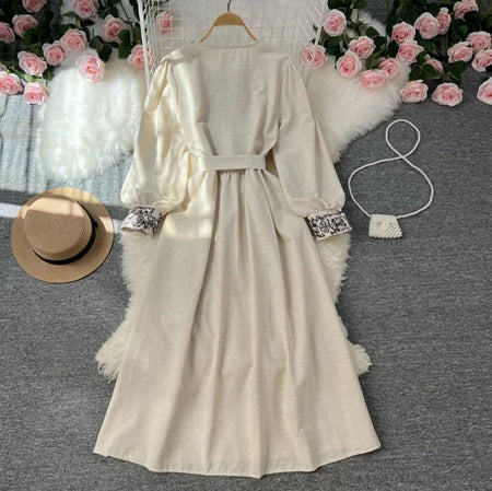 Lyra Statement Belted Dress In Beige