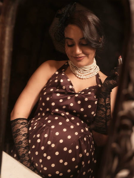 Inaya Drop Waist Polka Maxi Dress - seated close-up shot, dark brown with white polka dot - Miss Mosa By Akanksha