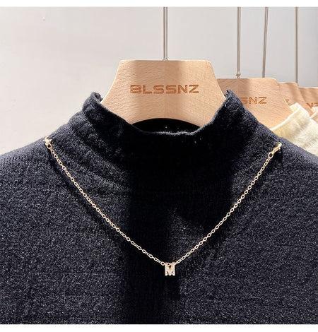 Ines Fleece Sweater - neckline close-up shot, black - Miss Mosa By Akanksha