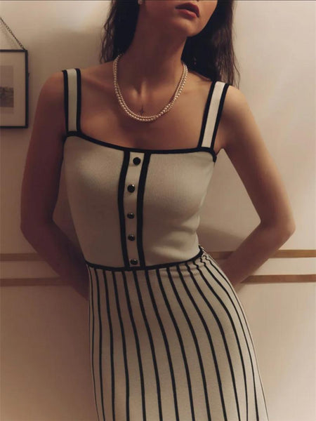 Irica Striped Soft Knit Dress In White - close-up shot of bodice and buttons on model - Miss Mosa By Akanksha