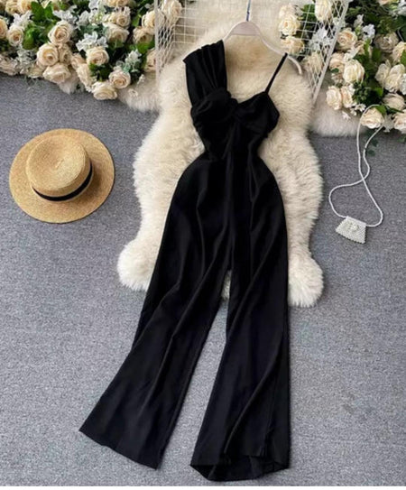 Isabella Statement Jumpsuit - styled flat-lay shot, black - Miss Mosa By Akanksha