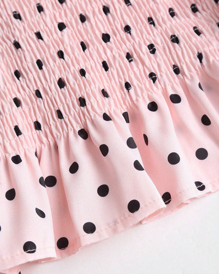 Isla Polka Summer Top - close-up shot of smocked waist and ruffle hem, pink with black polka dots - Miss Mosa By Akanksha