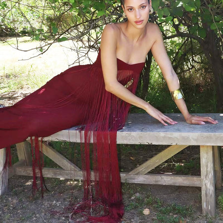 Itziar Fringe Maxi Dress - reclining shot on model outdoors, burgundy - Miss Mosa By Akanksha