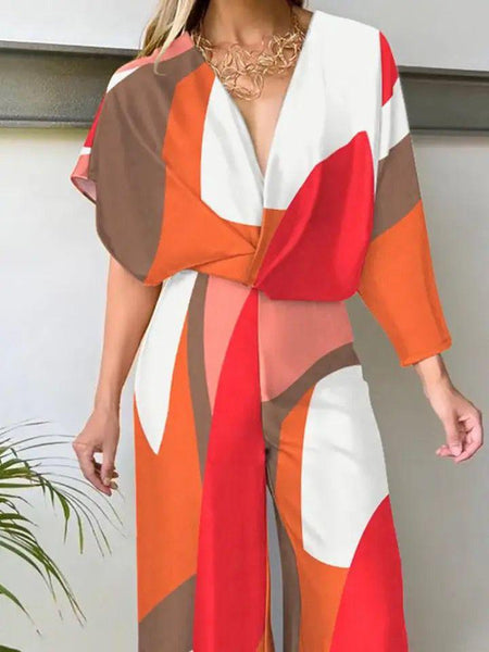 Ivanka Abstract Jumpsuit - front shot on model, orange multicolour - Miss Mosa By Akanksha