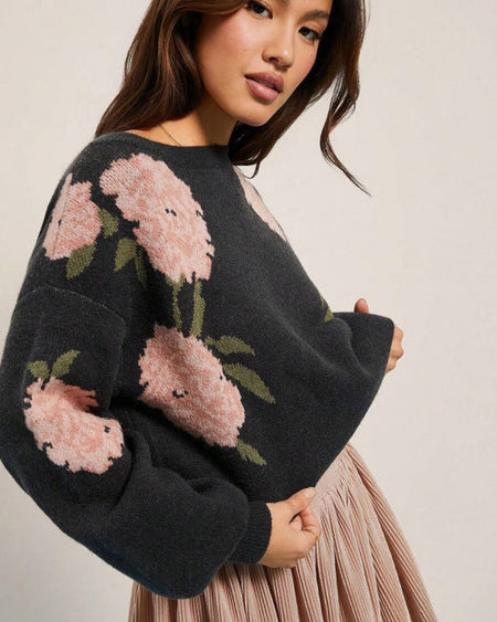 Ivano Floral Woolen Sweater - close-up shot on model, charcoal with pink floral - Miss Mosa By Akanksha