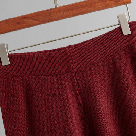 Ivona Premium Winter Coord Set - close-up of trouser waistband on hanger, maroon - Miss Mosa By Akanksha