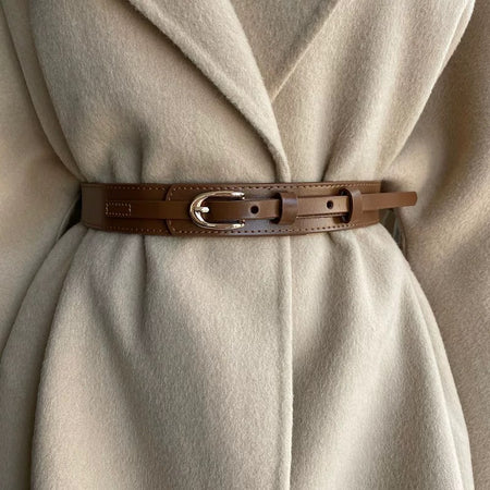 Jasper Statement Leather PU Belt - close-up of belt on coat, tan - Miss Mosa By Akanksha