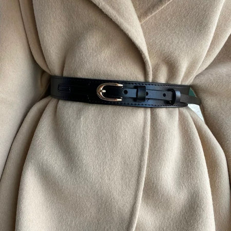Jasper Statement Leather PU Belt - close-up of belt on coat, black - Miss Mosa By Akanksha