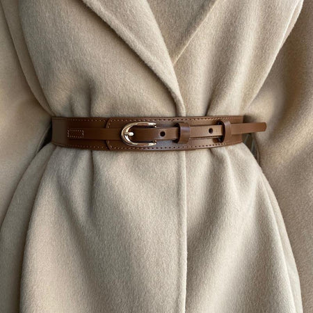 Jasper Statement Leather PU Belt - close-up of belt on coat, tan - Miss Mosa By Akanksha