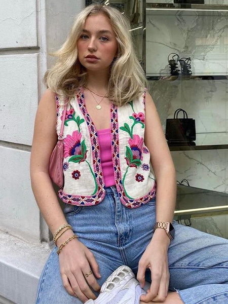 Jeeni Statement Vest Top In Beige - front shot on model worn over pink top - Miss Mosa By Akanksha