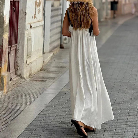 Jemini Summer Holiday Dress - styling shot on model with flowers, white and black - Miss Mosa By Akanksha