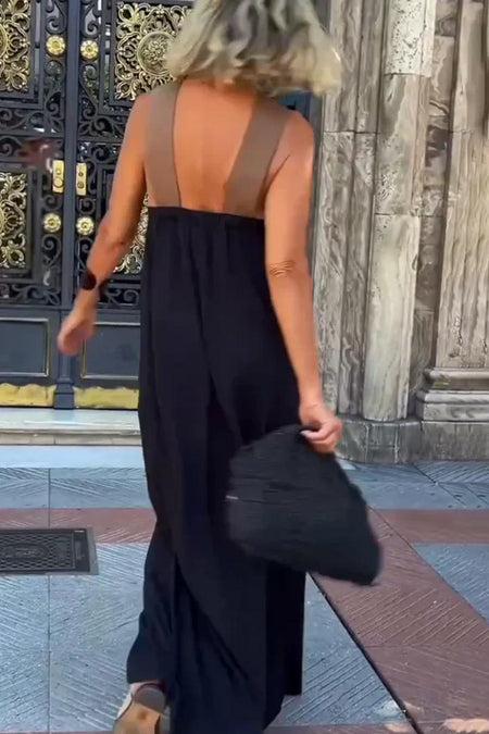 Jemini Summer Holiday Dress In Black - back shot on model walking - Miss Mosa By Akanksha