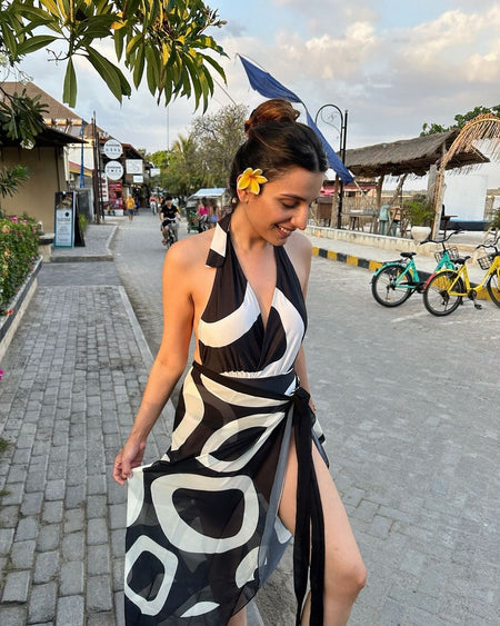 Jerry Swimsuit with Sarong In Black - lifestyle shot on model, black and white - Miss Mosa By Akanksha