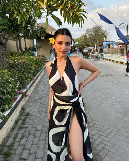 Jerry Swimsuit with Sarong In Black - lifestyle shot on model, black and white - Miss Mosa By Akanksha