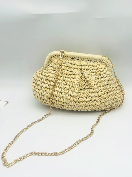 Jovie Straw Hand Bag With Chain - angled shot, cream woven straw with gold chain - Miss Mosa By Akanksha