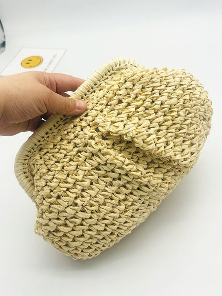 Jovie Straw Hand Bag With Chain - close-up shot held in hand, cream woven straw - Miss Mosa By Akanksha