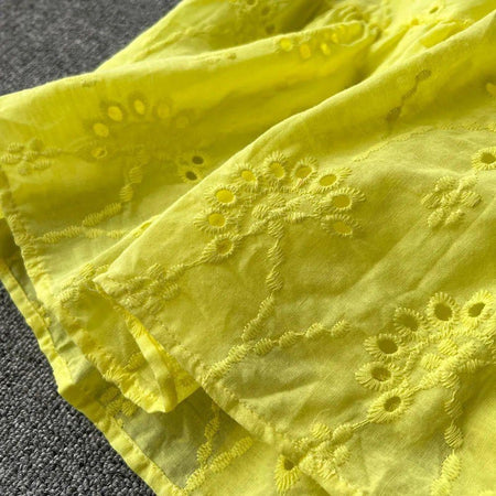 Julissa Cotton Eyelet Dress - close-up of eyelet fabric, yellow - Miss Mosa By Akanksha
