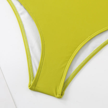 Kelly Rosette Swimsuit With Skirt In Neon - close-up of swimsuit gusset detail, lime green - Miss Mosa By Akanksha