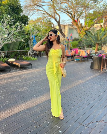 Keya Bodycon Midi Dress with Ruffle - lifestyle shot on model, yellow - Miss Mosa By Akanksha