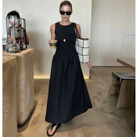 Keya Drop Waist Midi Dress - full-length front shot on model, black - Miss Mosa By Akanksha