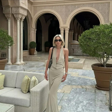 Kia Halterneck Maxi Dress In Beige - full-length front shot on model outdoors - Miss Mosa By Akanksha