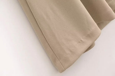 Kia Halterneck Maxi Dress In Beige - close-up of skirt drape - Miss Mosa By Akanksha