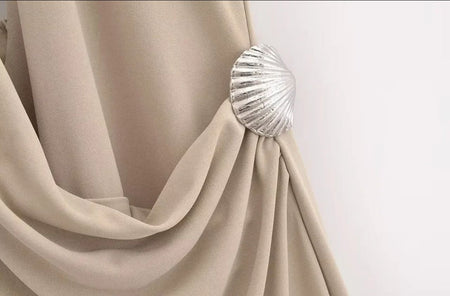 Kia Halterneck Maxi Dress In Beige - close-up of shell waist detail - Miss Mosa By Akanksha
