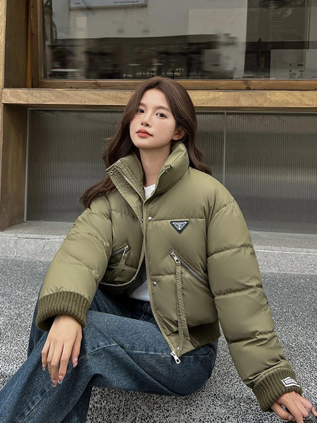 Kio Warm Parka Jacket In Army Green - front shot on model seated - Miss Mosa By Akanksha