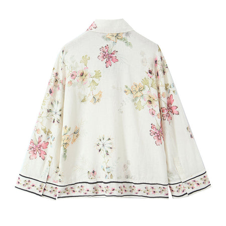 Klara Floral Shirt - close-up shot, ivory with blue floral print - Miss Mosa By Akanksha
