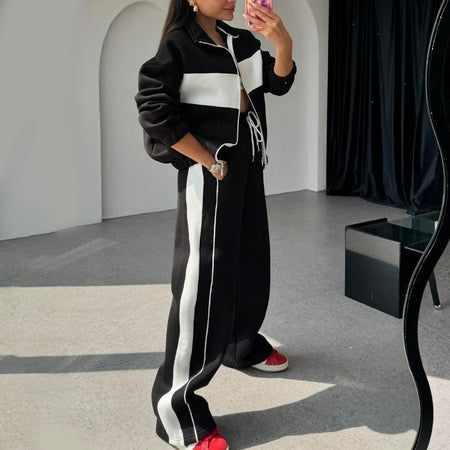 Kyler Premium Tracksuit - full-length side shot on model in mirror, black and white - Miss Mosa By Akanksha