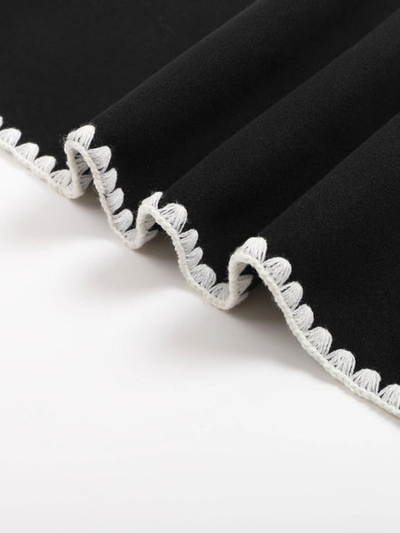 Laura Long Oversized Woolen Jacket with Scarf - close-up of contrast stitched hem, black and white - Miss Mosa By Akanksha