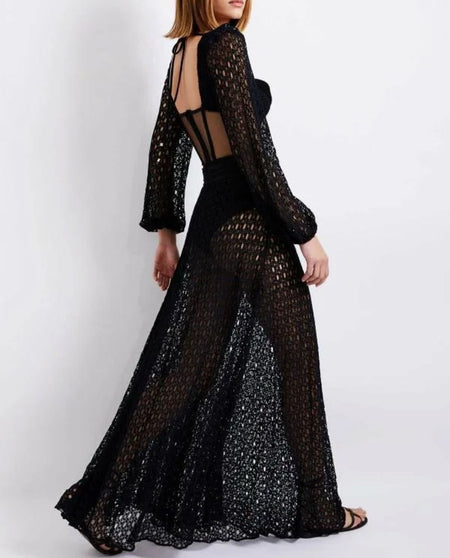 Laurel Statement Swimsuit With Attached Skirt - back shot on model, black - Miss Mosa By Akanksha