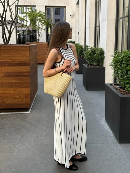 Lavinia Striped Holiday Dress In White - side shot on model outdoors - Miss Mosa By Akanksha