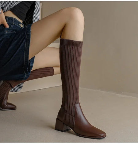 Lia Knee High Trendy Sock Leather Boots - side shot on model seated, brown - Miss Mosa By Akanksha