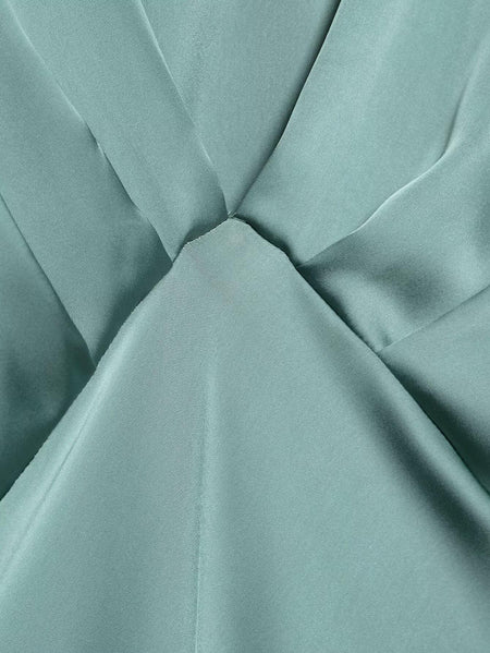 Lipasa Satin Midi Dress In Sage Green - close-up of fabric detail - Miss Mosa By Akanksha