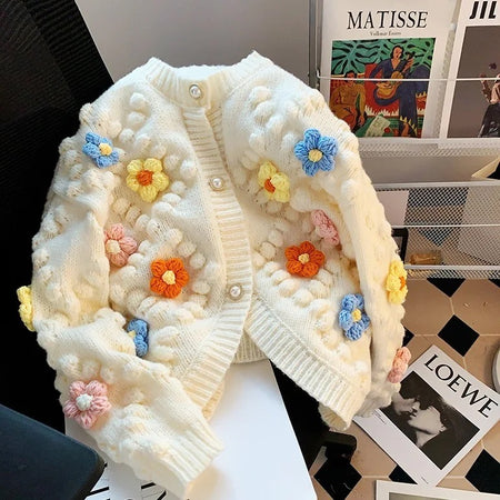 Lisido Statement Woolen Sweater with Flower Detail - flat-lay shot of cardigan, cream - Miss Mosa By Akanksha