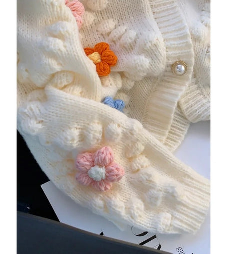 Lisido Statement Woolen Sweater with Flower Detail - close-up of flower detail, cream - Miss Mosa By Akanksha