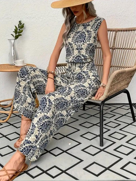 Loret Summer Printed Jumpsuit In Off-White - styling shot on model outdoors - Miss Mosa By Akanksha