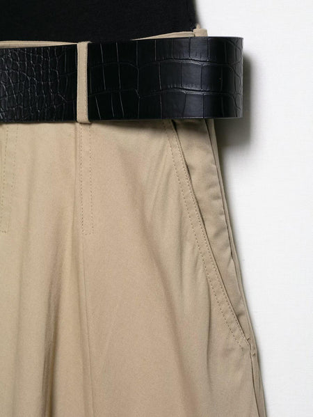 Lucy Luxe Elegant Pleated Dress With Belt In Black - close-up of belt and pleated skirt detail - Miss Mosa By Akanksha