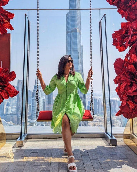 Luna Summer Cotton Eyelet Dress - lifestyle shot on model, green - Miss Mosa By Akanksha