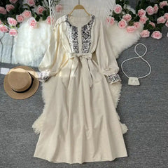 Lyra Statement Belted Dress - front flat-lay product shot on hanger, cream and black - Miss Mosa By Akanksha