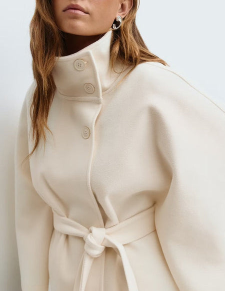 Maddy Winter Cape With Belt - close-up shot on model, cream - Miss Mosa By Akanksha
