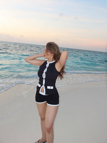 Madley Soft Knit Coord Set In Black - side shot on model on beach - Miss Mosa By Akanksha