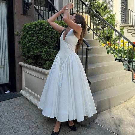 Maira Drop Waist Midi Dress in White - front shot on model, white - Miss Mosa By Akanksha