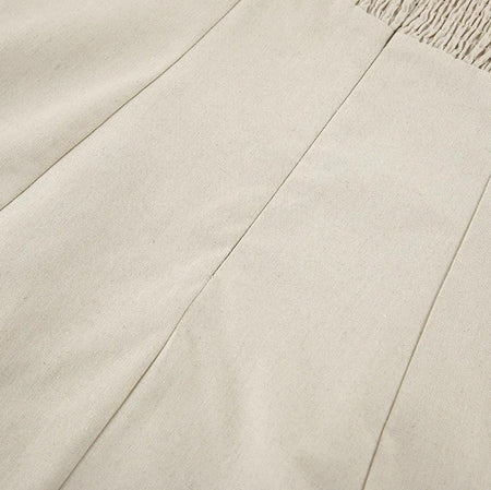 Maisie Offshoulder Holiday Tube Dress In Beige - close-up of fabric panel seam detail - Miss Mosa By Akanksha