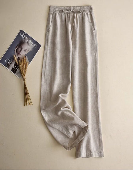 Manon Statement Linen Pants In Beige - flat-lay product shot with magazine - Miss Mosa By Akanksha